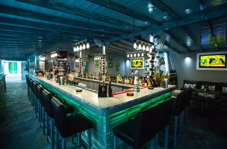 The long bar under green light