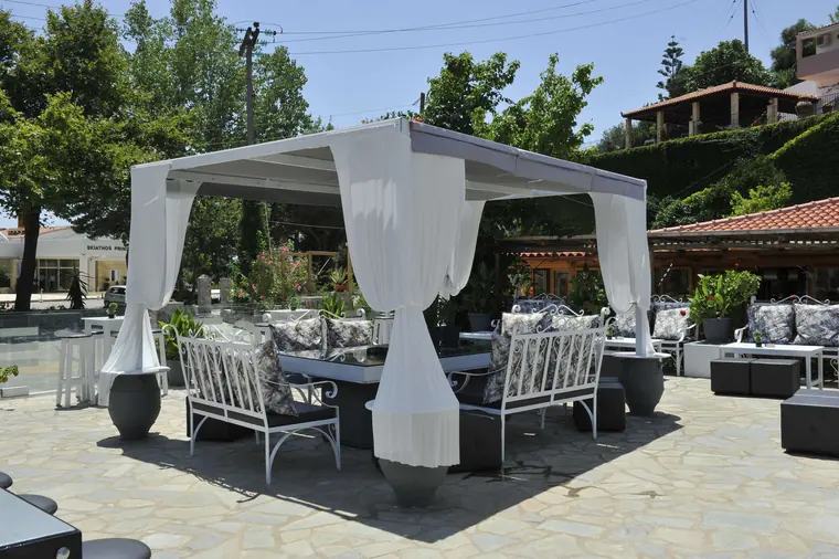 The cabana with sofas and curtains