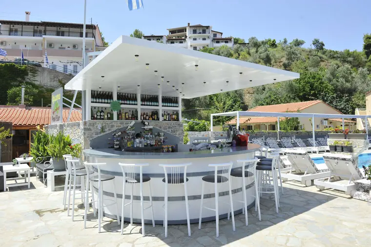 The round white pool bar under its canopy