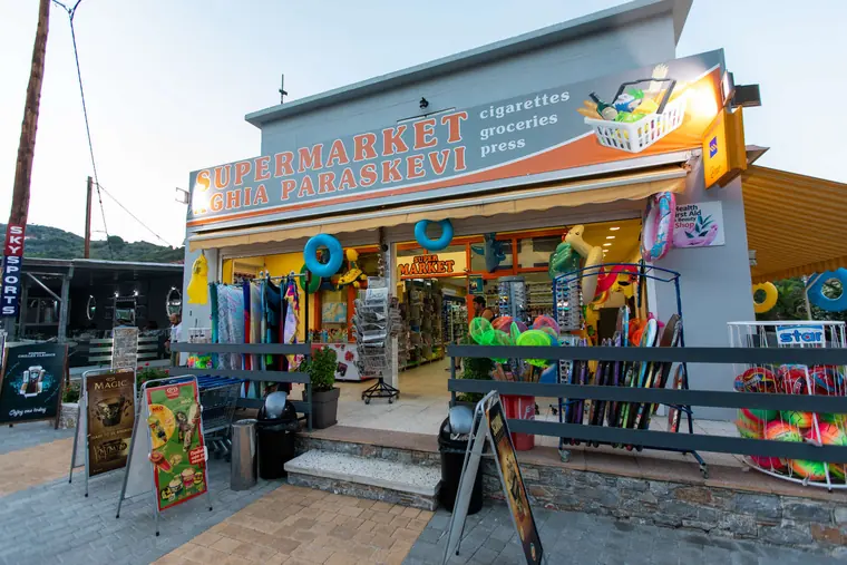 The shop next door, with beach toys and groceries